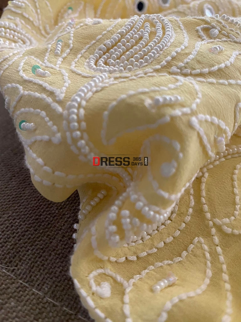 Exclusive Lemon Yellow Pearl & Mirror Chikankari Suit Suits