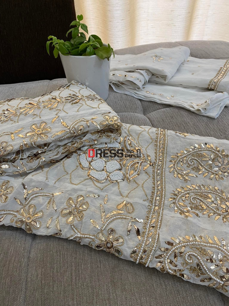 Ivory Heavy Pearl & Mukaish Anarkali Suit Chikankari