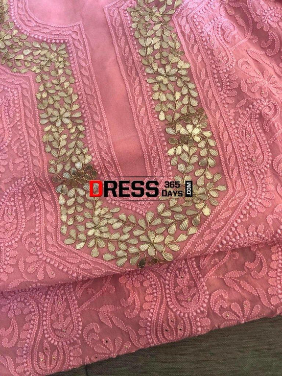 Peachish pink chikankari embroidered pure cotton unstitched salwar material, embroidered yoke with lace work(lining optional)matching cotton bottom,brush paint work on fancy chiffon dupatta with lace tapping. MR262613 main image 1